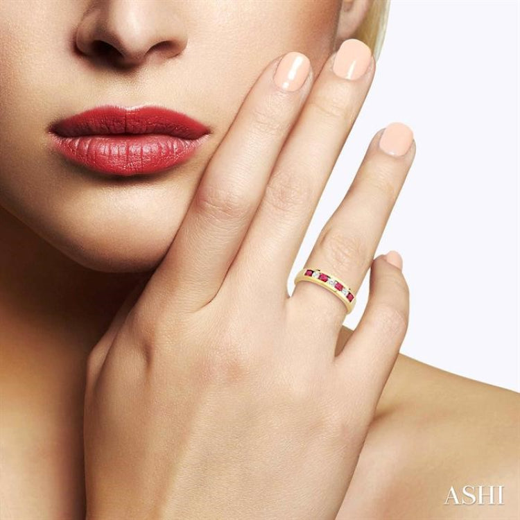 2.5 MM Round Cut Ruby and 1/5 Ctw Channel Set Round Cut Diamond Band in 14K Yellow Gold