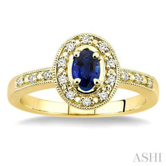 5x3 MM oval cut Sapphire and 1/10 Ctw Round Cut Diamond Ring in 14K Yellow Gold.