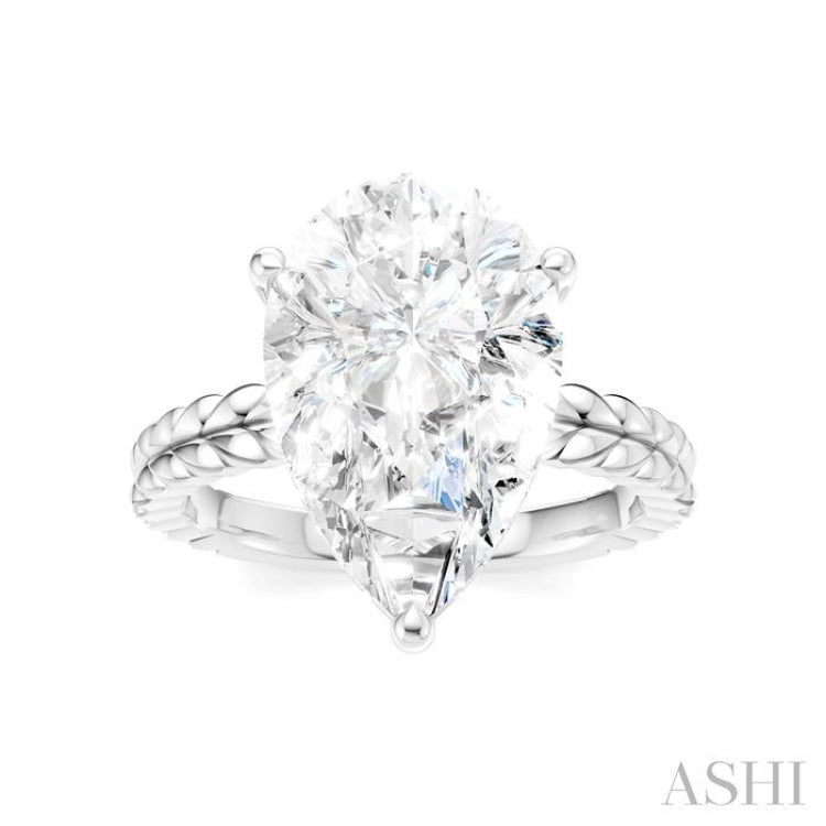 1/8 Ctw Pear Shape Round Cut Diamond Semi-Mount Engagement Ring in 14K White Gold