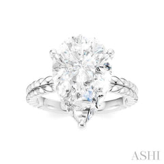 1/8 Ctw Pear Shape Round Cut Diamond Semi-Mount Engagement Ring in 14K White Gold
