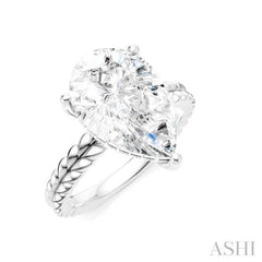 1/8 Ctw Pear Shape Round Cut Diamond Semi-Mount Engagement Ring in 14K White Gold