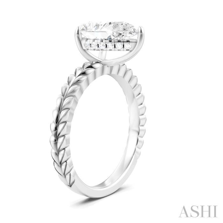 1/10 Ctw Pear Shape Round Cut Diamond Semi-Mount Engagement Ring in 14K White Gold