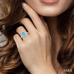 9x6 MM Pear Shape Blue Topaz and 1/10 Ctw Lattice Round Cut Diamond Semi-Precious Ring in 10K White Gold