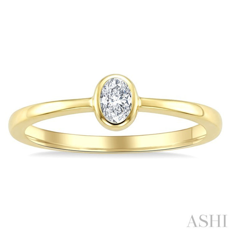 1/5 Ctw Bezel Set Oval Cut Diamond Fashion Ring in 14K Yellow Gold