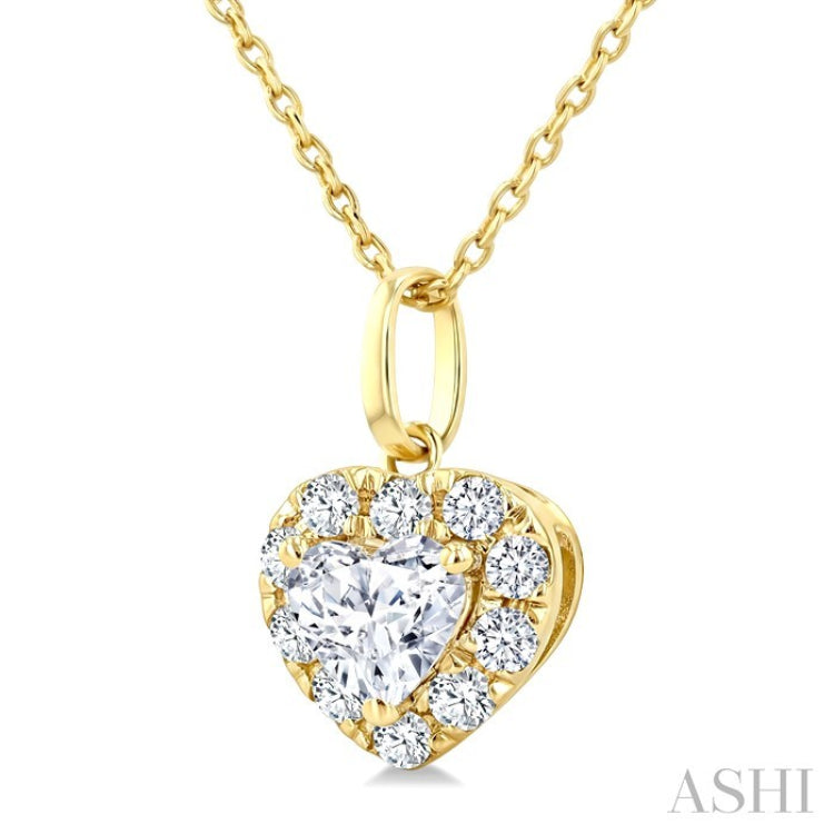 1/4 Ctw Heart and Round Cut Diamond Fashion Halo Pendant With Chain in 14K Yellow Gold