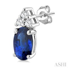 1/20 Ctw Oval Cut 5X3 MM Sapphire and Round Cut Diamond Precious Earrings in 10K White Gold