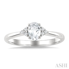 1/20 Ctw Oval Cut 6X4 MM White Topaz and Round Cut Diamond semi-precious Ring in 10K White Gold