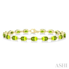 6X4 MM Oval Cut Peridot and 1/6 Ctw Round Cut Diamond Semi-Precious Tennis Bracelet in 10K Yellow Gold