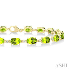 6X4 MM Oval Cut Peridot and 1/6 Ctw Round Cut Diamond Semi-Precious Tennis Bracelet in 10K Yellow Gold