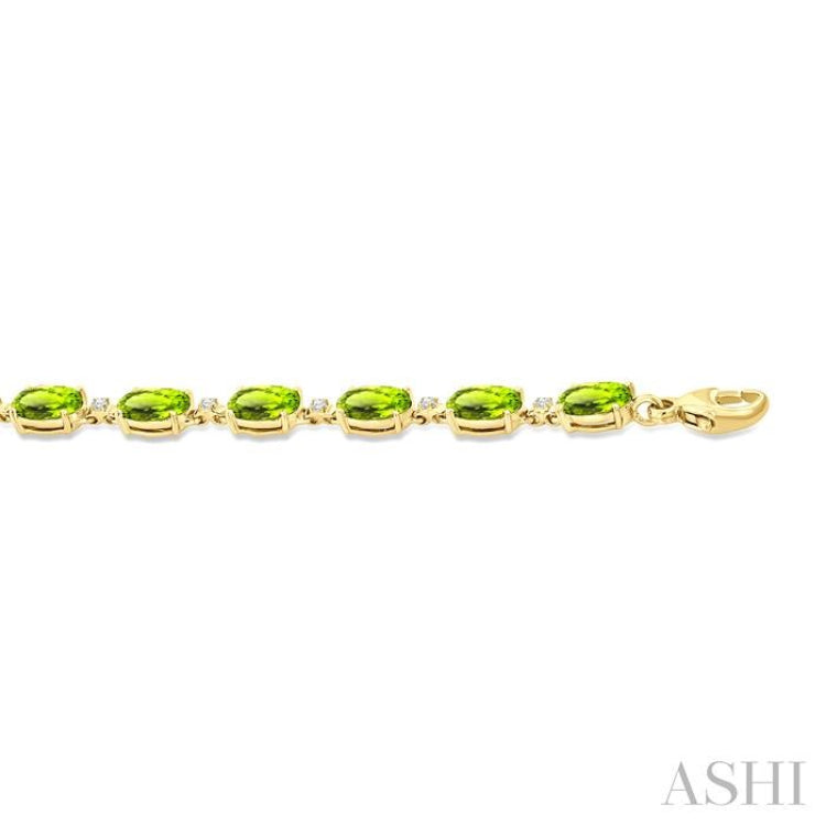 6X4 MM Oval Cut Peridot and 1/6 Ctw Round Cut Diamond Semi-Precious Tennis Bracelet in 10K Yellow Gold