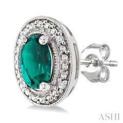 6X4 MM Oval Shape Lab-Created Emerald and 1/50 Ctw Round Cut Diamond Precious Earring in Sterling Silver