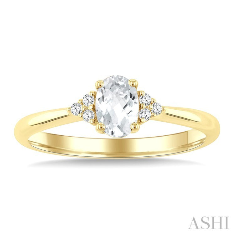 1/20 Ctw Oval Cut 6X4 MM White Topaz and Round Cut Diamond semi-precious Ring in 10K Yellow Gold