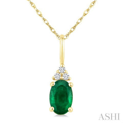 1/50 Ctw Oval Cut 6X4 MM Emerald and Round Cut Diamond Precious Pendant With Chain in 10K Yellow Gold