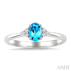 1/20 Ctw Oval Cut 6X4 MM Blue Topaz and Round Cut Diamond semi-precious Ring in 10K White Gold