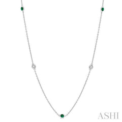 1.75 MM Emerald and 1/6 Ctw Round Cut Diamond Precious Station Necklace in 14K White Gold