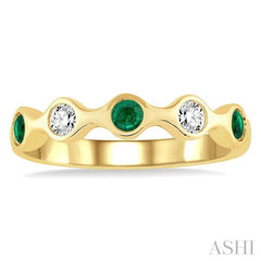 2.8 MM Bezel Set Emerald and 1/6 Ctw Round Cut Diamond Precious Stackable Band in 14K Yellow Gold