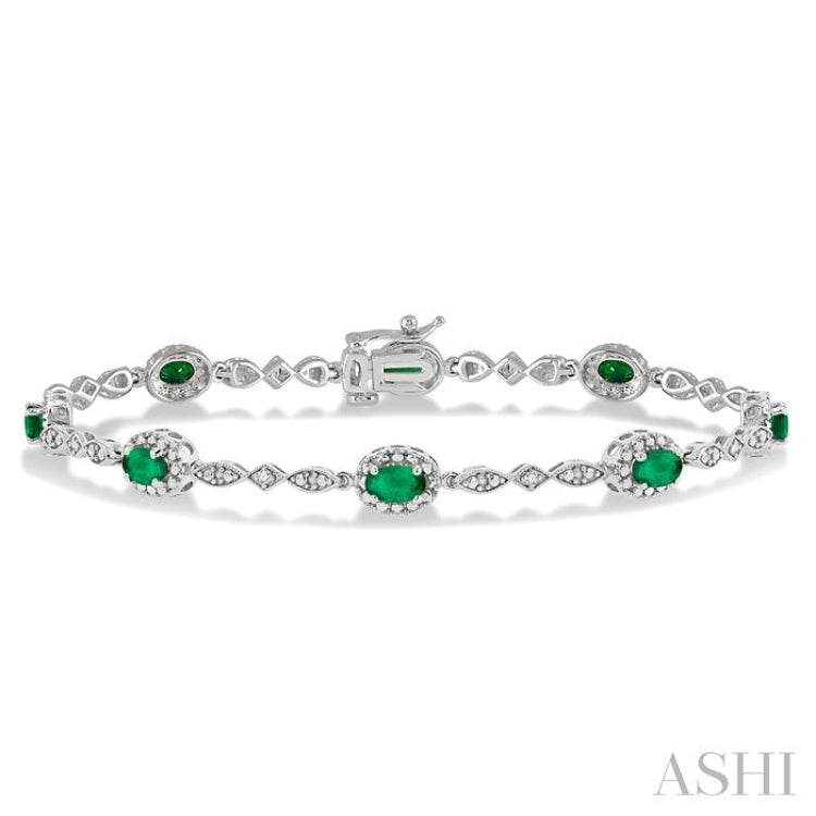 5x3 MM Oval Cut Emerald and 1/20 Ctw Round Cut Diamond Bracelet in 10K White Gold