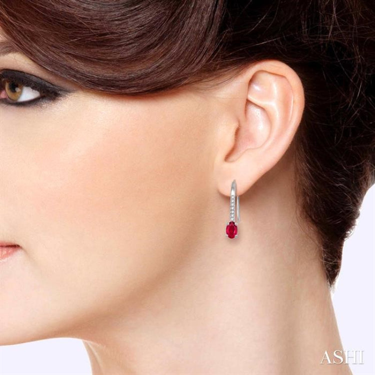 5x3 MM Oval Cut Ruby and 1/20 Ctw Round Cut Diamond Precious Earrings in 10K White Gold