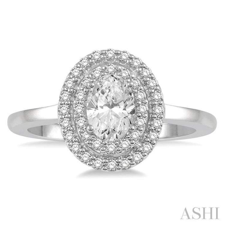 3/4 Ctw Round & Oval Cut Diamond Ladies Engagement Ring with 1/2 Ctw Oval Cut Center Stone in 14K White Gold