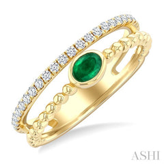 4x3 MM Oval Shape Emerald and 1/5 Ctw Round Cut DiamondsPrecious Fashion Split Twin Ring in 10K Yellow Gold