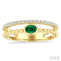 4x3 MM Oval Shape Emerald and 1/5 Ctw Round Cut DiamondsPrecious Fashion Split Twin Ring in 10K Yellow Gold