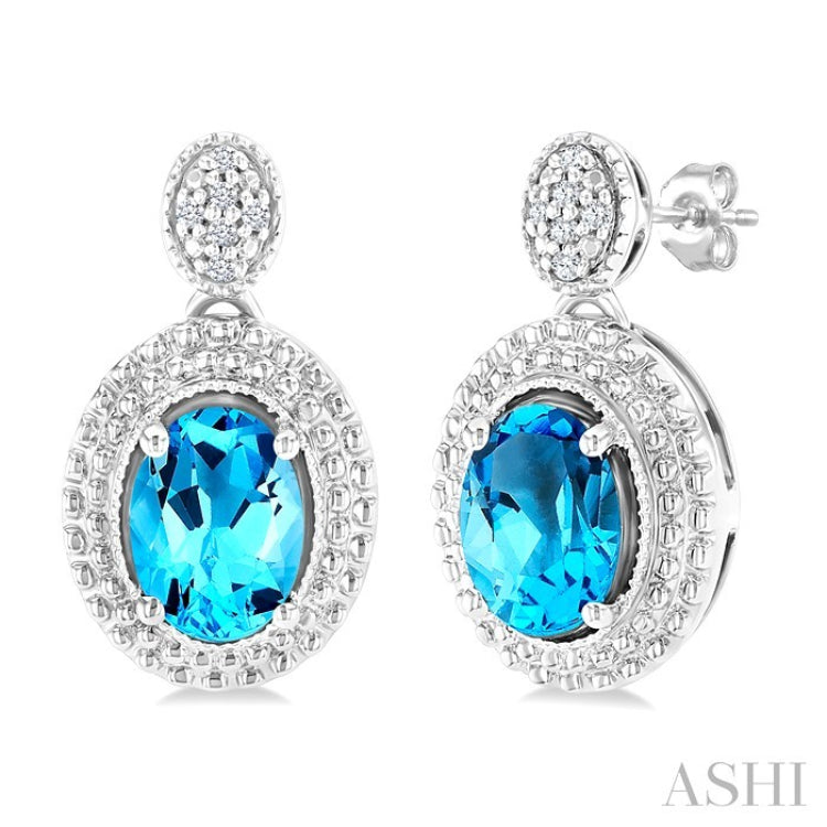 7X5 MM Oval Cut Blue Topaz and 1/20 Ctw Round Cut Diamond Semi-Precious Earring in Sterling Silver