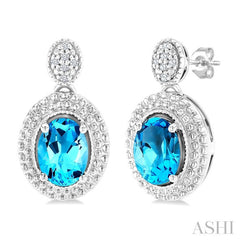 7X5 MM Oval Cut Blue Topaz and 1/20 Ctw Round Cut Diamond Semi-Precious Earring in Sterling Silver