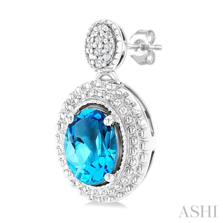 7X5 MM Oval Cut Blue Topaz and 1/20 Ctw Round Cut Diamond Semi-Precious Earring in Sterling Silver