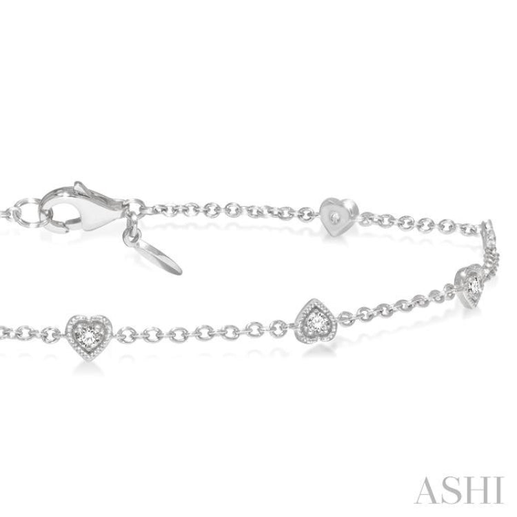 1/6 Ctw Heart Shape Mount Round Cut Diamond Station Bracelet in 10K White Gold