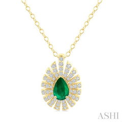 1/3 Ctw Starburst 6X4MM Pear Cut Emerald and Round Cut Diamond Precious Pendant With Chain in 14K Yellow Gold